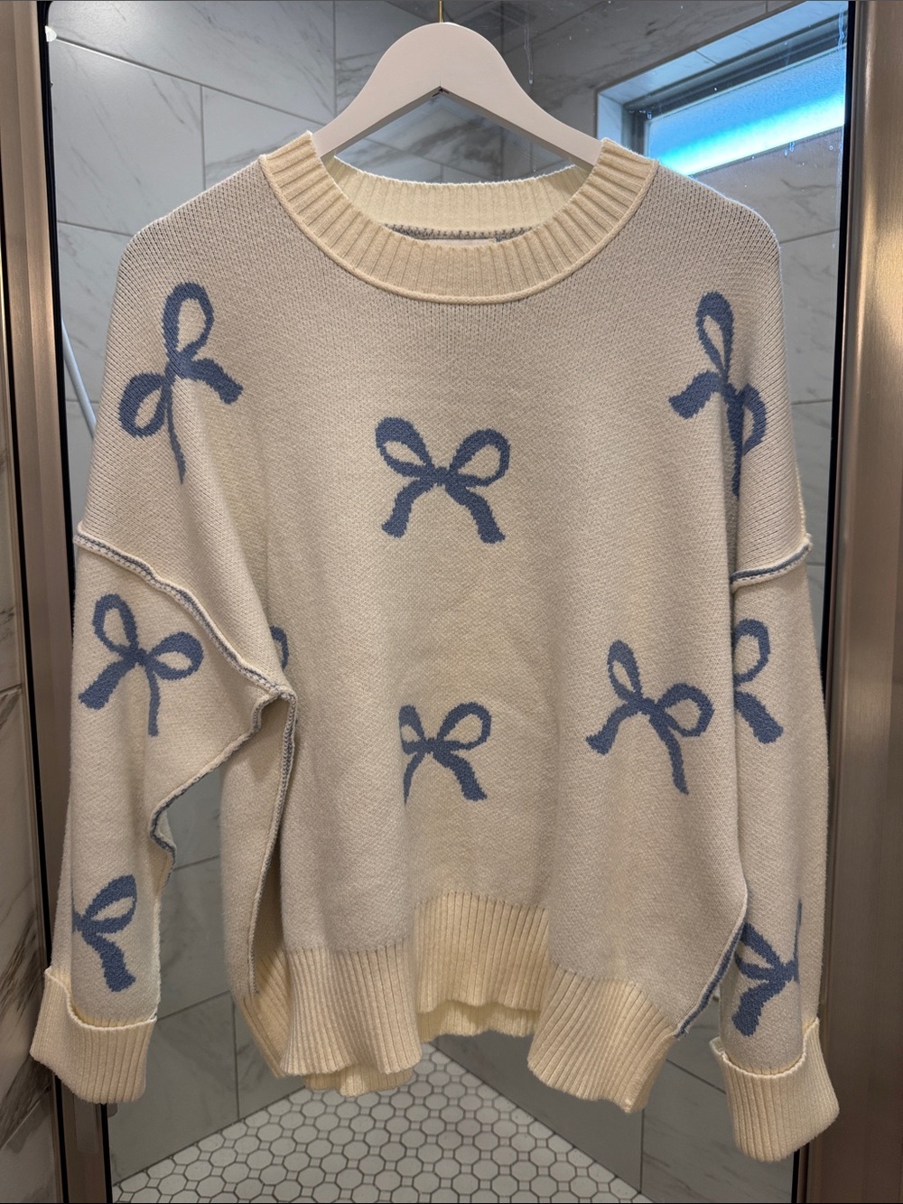 She + Sky Cream Sweater with Light Blue Bow Motif